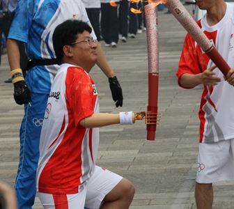 The torchbearers of Beijing Olympic Games use our products